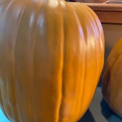 Lot 271 - two real looking pumpkins