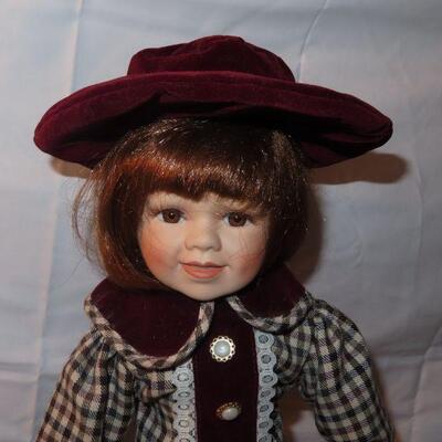 Porcelain Doll with short red hair 