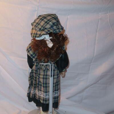Porcelain Doll with curly red hair 