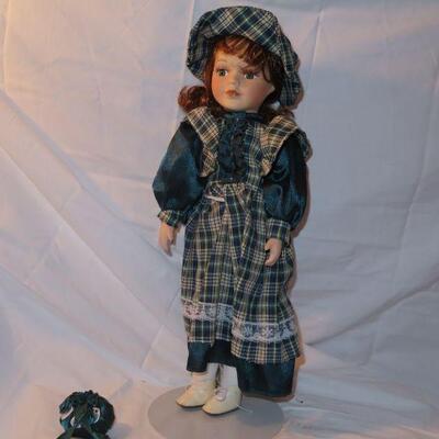 Porcelain Doll with curly red hair 