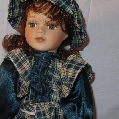 Porcelain Doll with curly red hair 