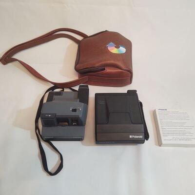 16 - 2 Polaroid Cameras
