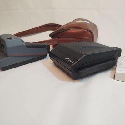 16 - 2 Polaroid Cameras