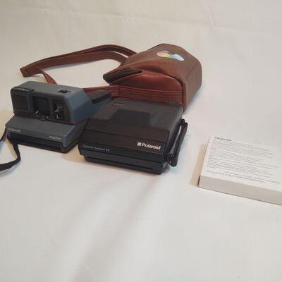 16 - 2 Polaroid Cameras