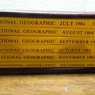 1983 National Geographic Magazine - complete set of 12 with faux leather cases Cases in great condition Books in normal good condition