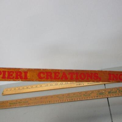 Lot 103 - Advertising Measuring Sticks