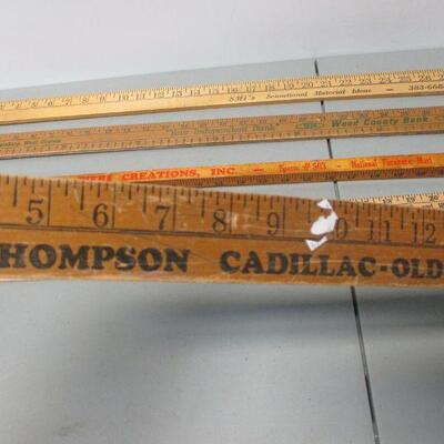 Lot 103 - Advertising Measuring Sticks