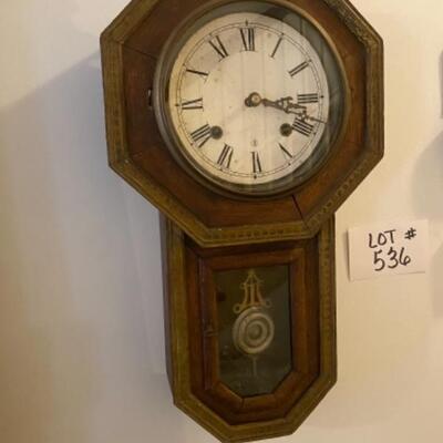 A536 Antique Wall Clock with Key | EstateSales.org