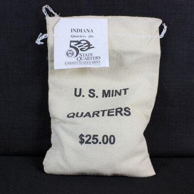 LOT#84J: Mint Bag Quarters #1 (Sewn shut, original packaging)