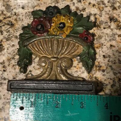 Vintage Cast iron small  doorstop / used as a window stop