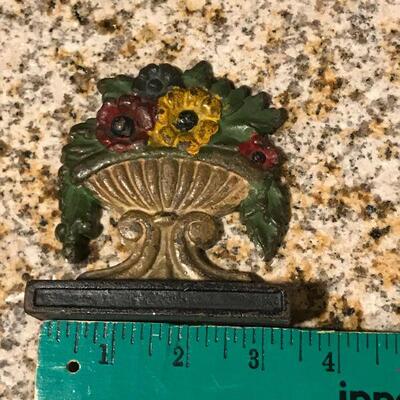Vintage Cast iron small  doorstop / used as a window stop