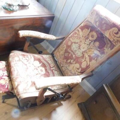 Antique Upholstered Recliner with Sliding Foot Rest