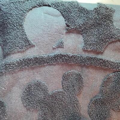 Lot 553 - Mickey Mouse Towels. black on black