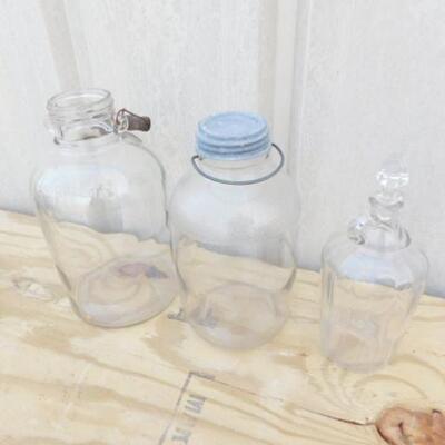 Large Glass Ball Jars with Wire Handles and a Collector Glass Bottle