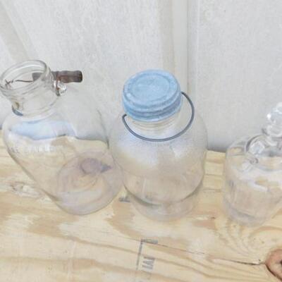 Large Glass Ball Jars with Wire Handles and a Collector Glass Bottle