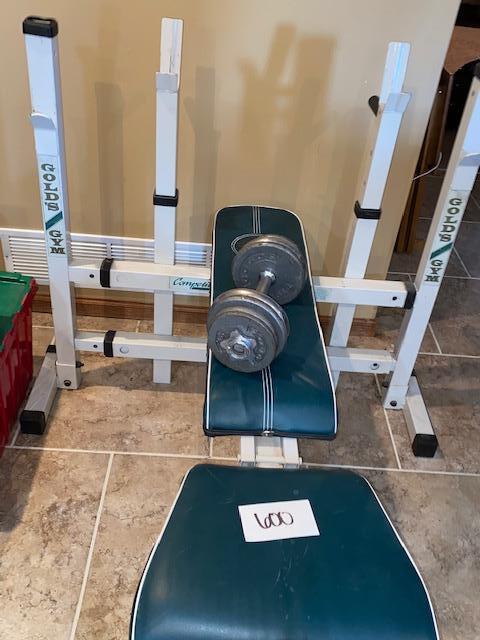 Lot 600 Golds Gym weight bench EstateSales
