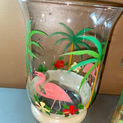 Lot 646 - 3 flamingo candle holders