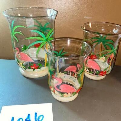 Lot 646 - 3 flamingo candle holders