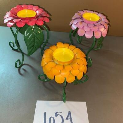 Lot 654 - flower candle holders