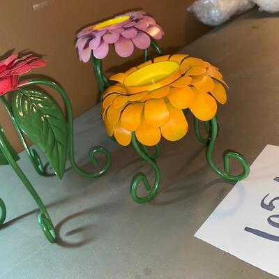 Lot 654 - flower candle holders
