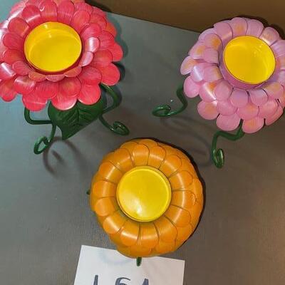 Lot 654 - flower candle holders