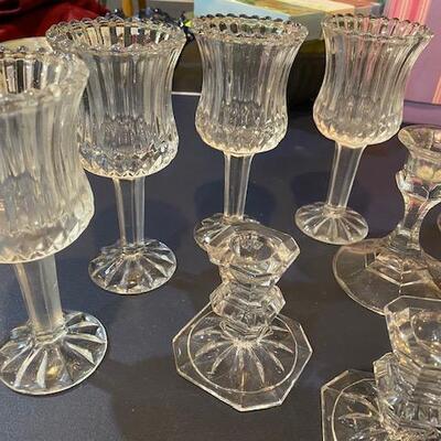 Lot 666 - Glass candle holders