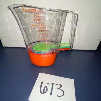 Lot 673 - Pampered chef Stackable measuring cup set