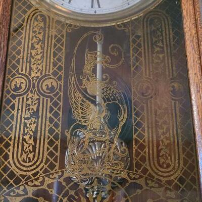 Lot 7:  Antique oak Clock