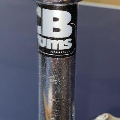 Lot 702 - Drum stand and sticks