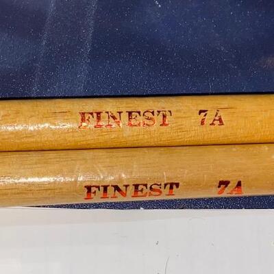 Lot 702 - Drum stand and sticks