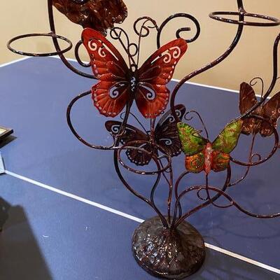 Lot 709 - butterfly candle holder