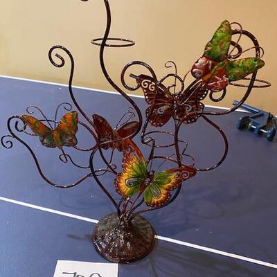 Lot 709 - butterfly candle holder