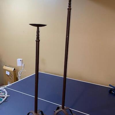 Lot 731 - Tall candle stands