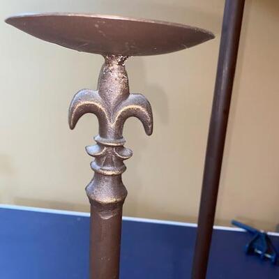 Lot 731 - Tall candle stands