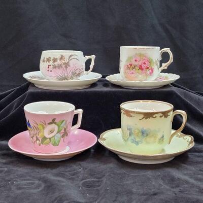Lot 14: Set of 4 Fine China Mustache Tea Cup and Saucers