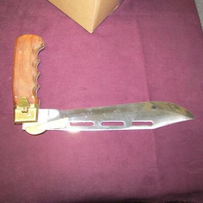 LOT 12   FOLDING KNIFE WITH SHEATH