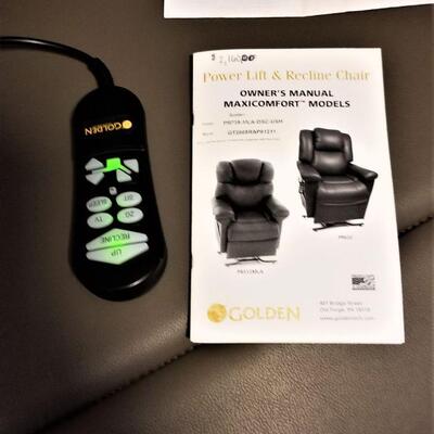 Lot #50  Like New Lift/Power Chair - LEATHER - reclines to sleeping position - has books & original receipt