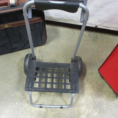 Lot 191 - Suit Cases & Rolling Carts