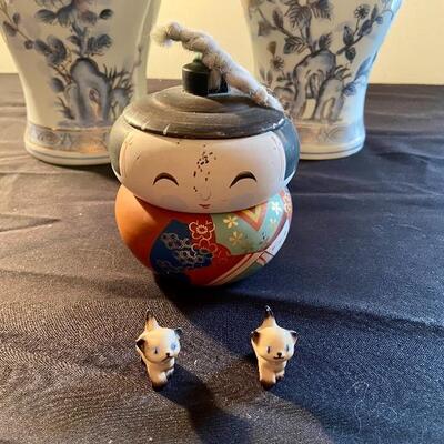 Lot 8: Oriental Vases, kokeshi dolls, Signed Fenton and more