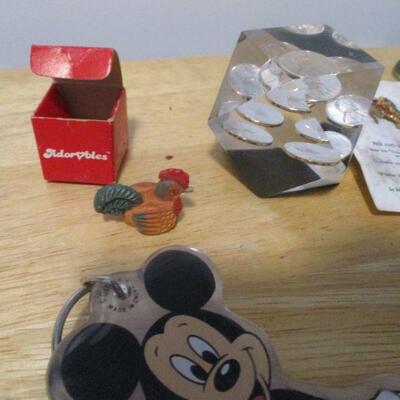 Lot 216 - Acrylic 1977 Penny Paper Weight & Key Chains