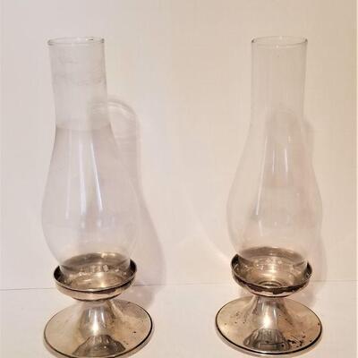 Lot #81  Pair of Weighted Sterling Candle Holders with Hurricane Shades