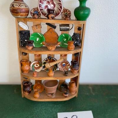 Lot 38 - Little shelf with tiny pottery
