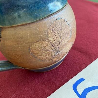 Lot 55 -  Stoneware Pottery Mug with leaves