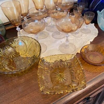Lot 8. Assortment of colored glass, along with amber stemware--$65