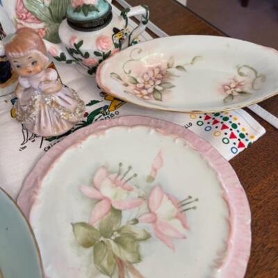 Lot 11. Vintage and contemporary porcelain, pottery, cookie jars, containers, Shirley Temple pitcher, etc.--$45