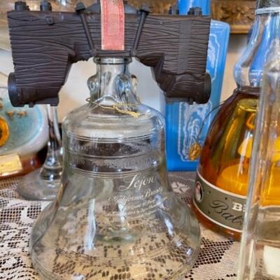 Lot 16. Assorted liquor decanters and martini shakers--$55