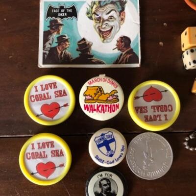 Lot 32. Vintage mid-century games/vintage decks of cars; 45 RPM record rack, dice, vintage childrenâ€™s game and badges, and marble Aztec...