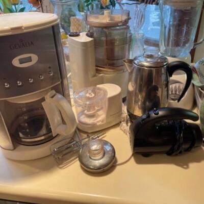 Lot 46. Assorted small appliance--Gevalia coffee maker, food processor, Sunbeam hand mixer, Farberware food processor, Oster blender,...