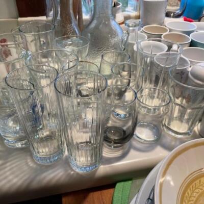 Lot 48. Glassware, plates and mugs--$25