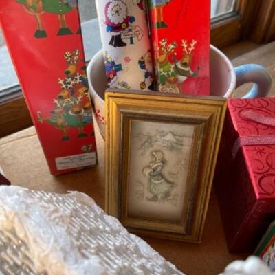 Lot 82. Assortment of Christmas itemsâ€”candles, dÃ©cor, ribbon, matches, frames, boxes, cards, votive holders, bowls, mugs--$15
